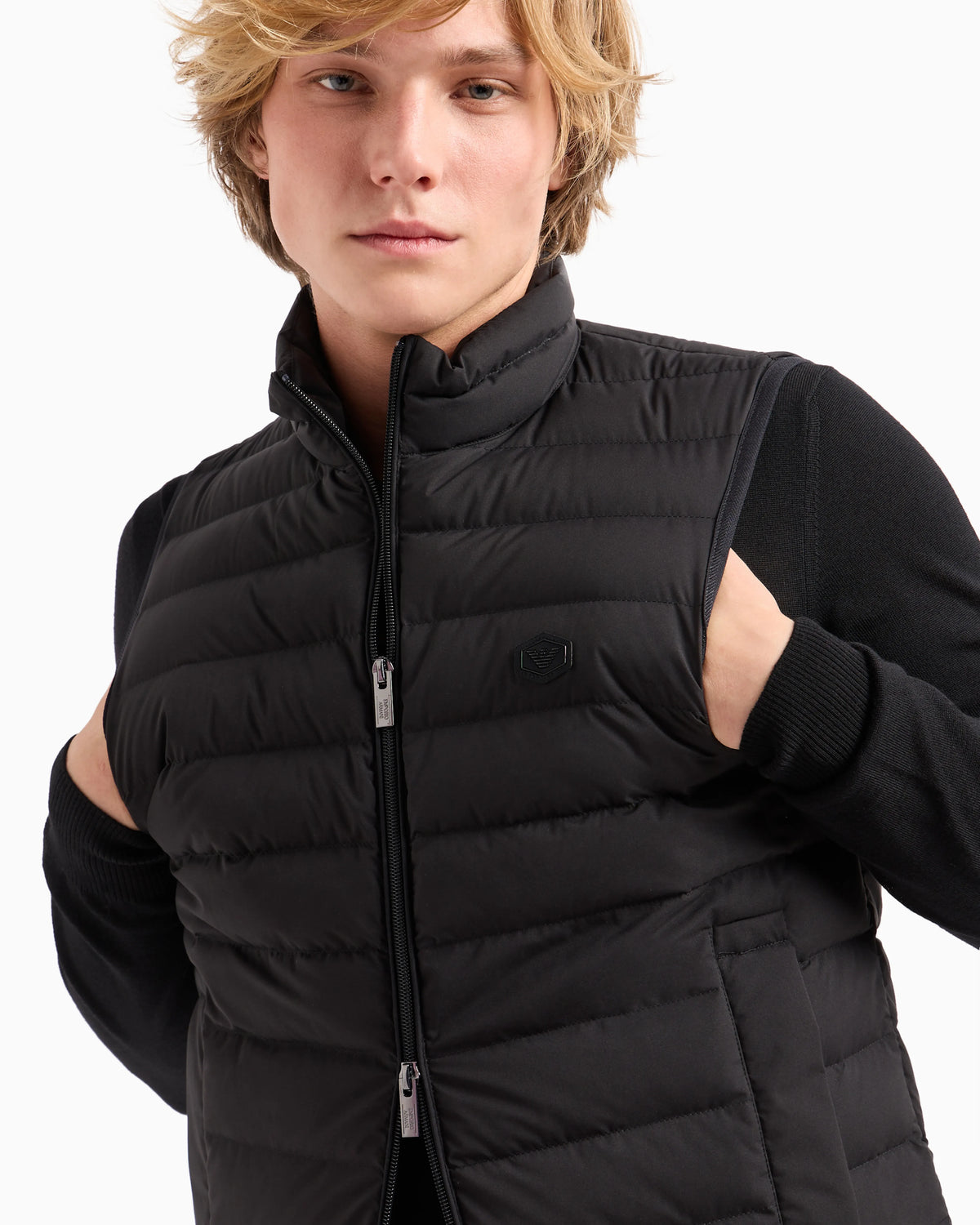 Sleeveless full-zip down jacket in quilted nylon with eagle logo patch