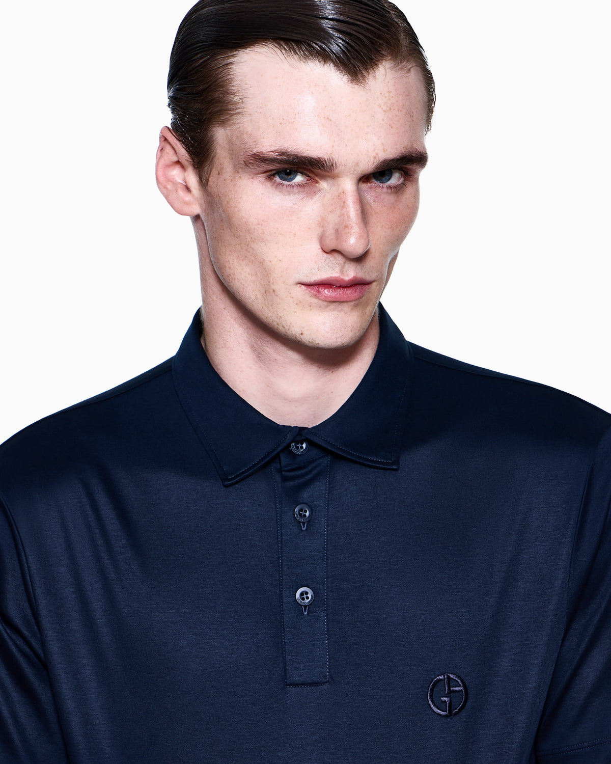 Interlock polo in cotton with an embroidered logo