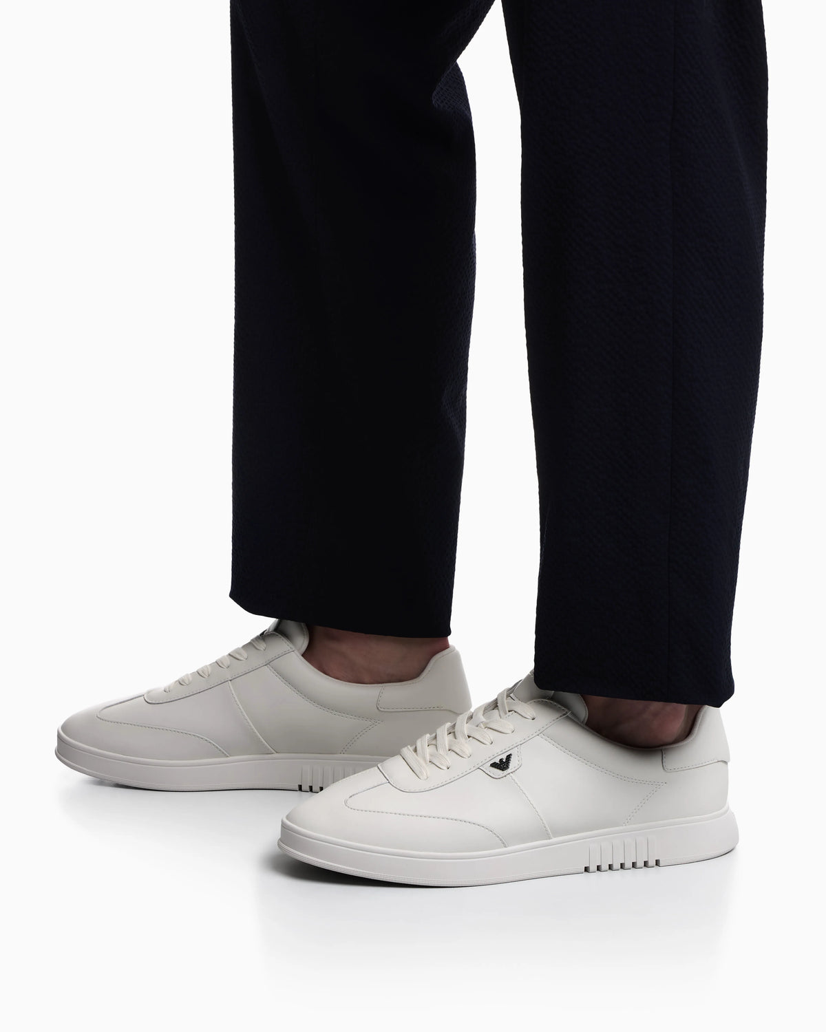 Leather sneakers with eagle plate