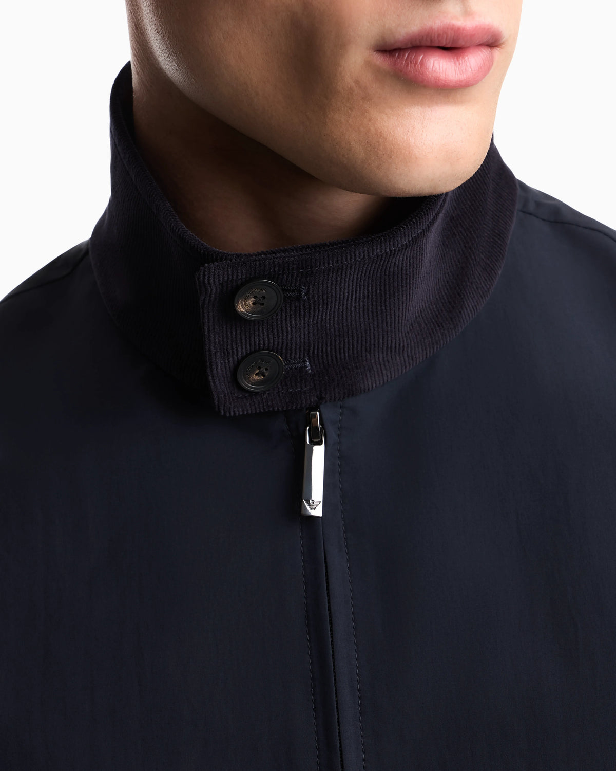 Blouson jacket with high collar and angled flap pockets