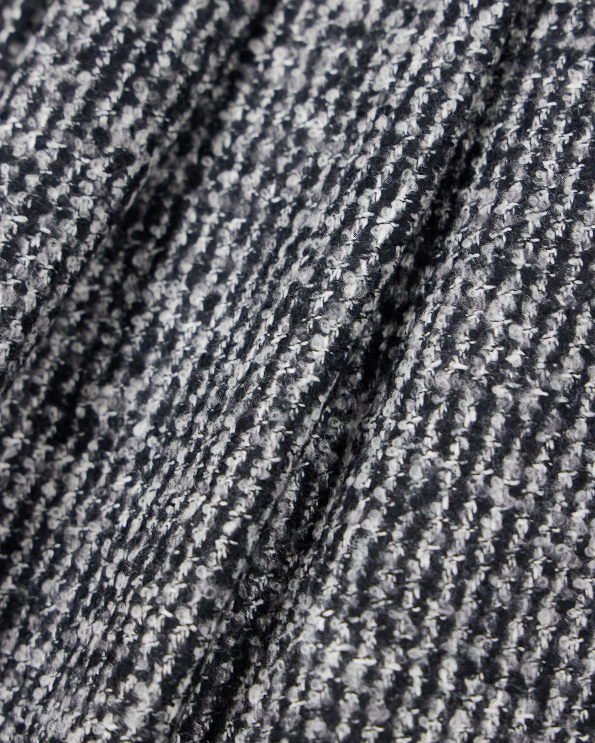 Patterned wool blend trousers with pleats and side pockets