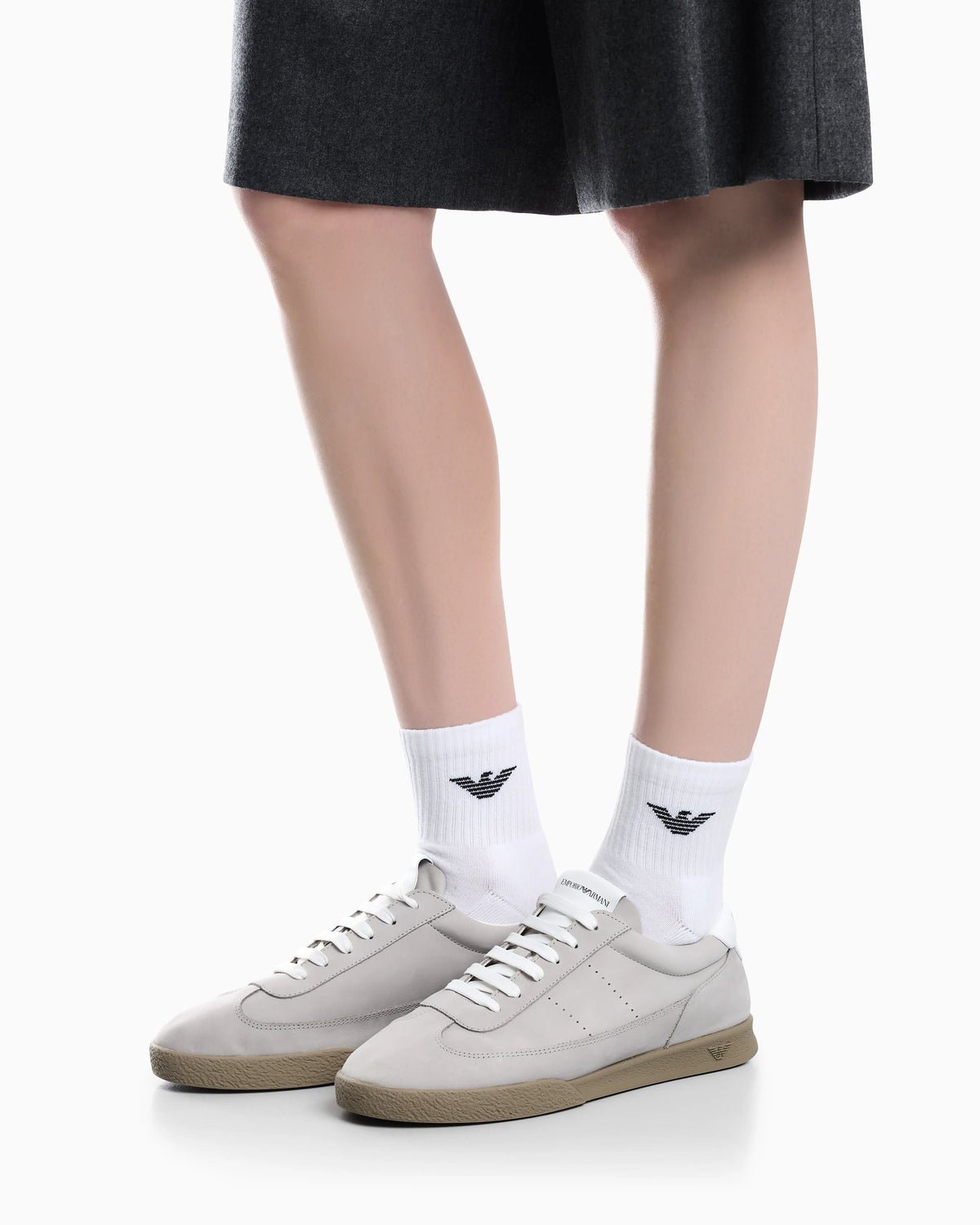 Nubuck sneakers with perforated details and a rubber sole