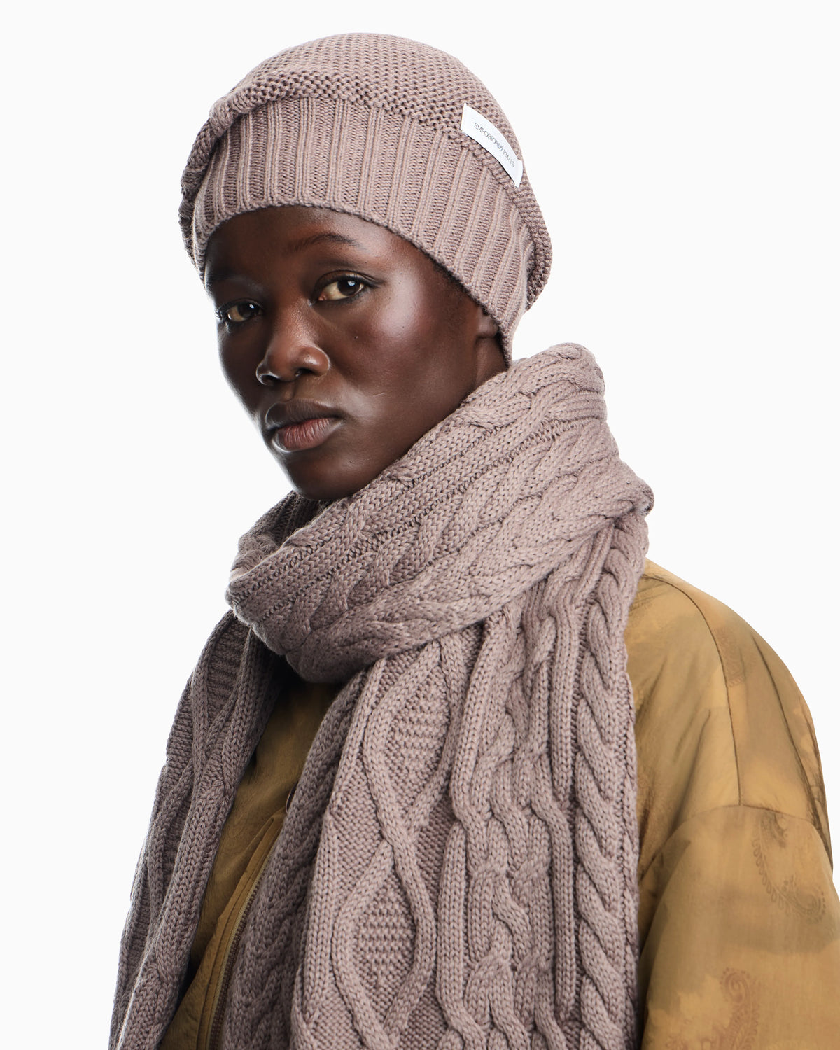Virgin wool cable knit beanie with a ribbed bottom