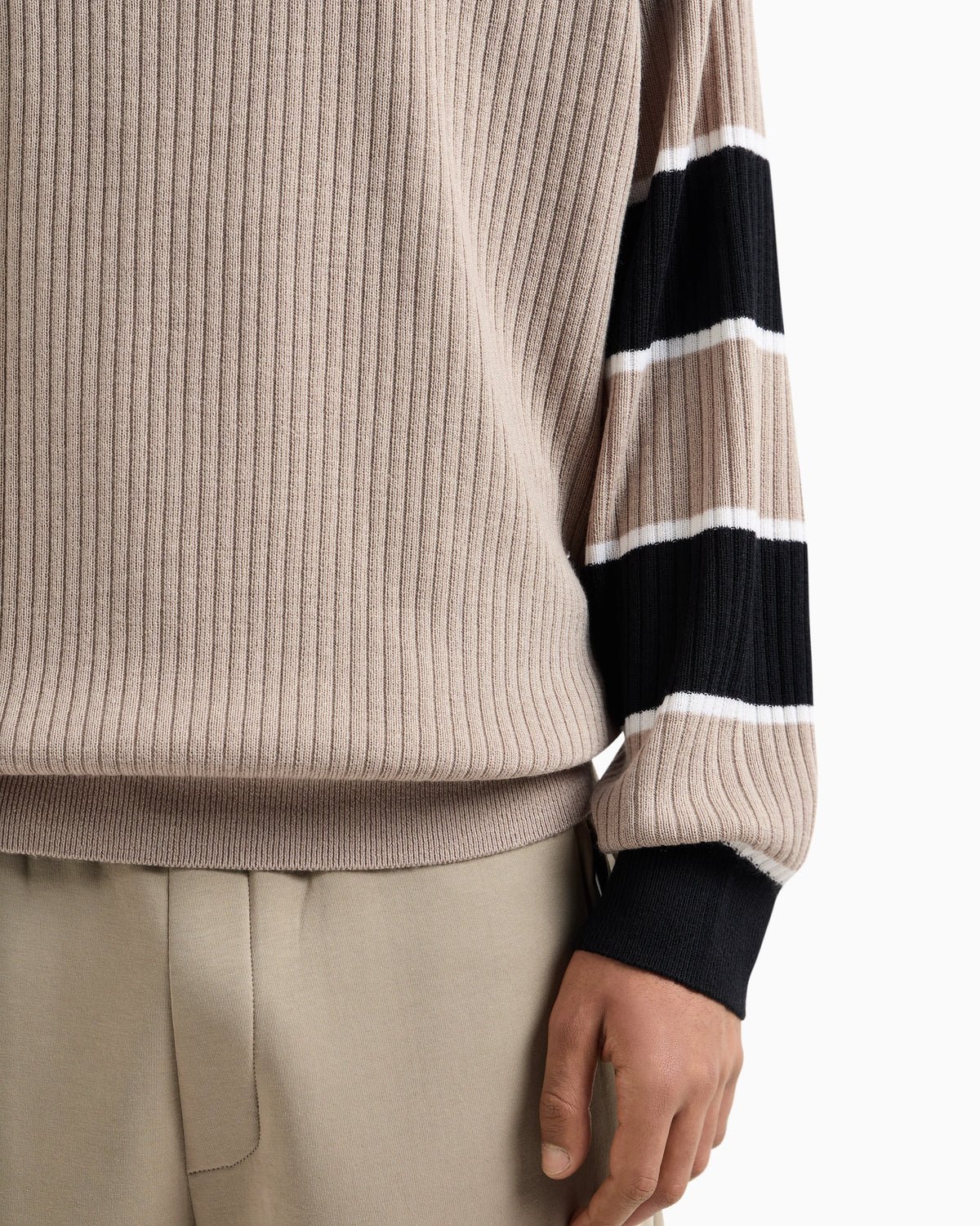 Zip-up sweater with striped sleeves