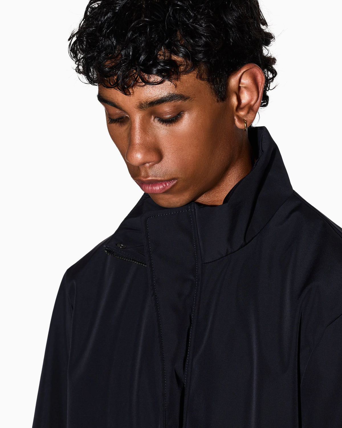 Overcoat with a high collar and concealed zipper Essential