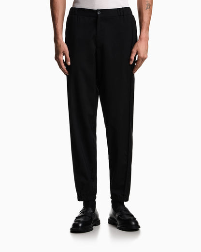 Natural stretch canvas trousers with elasticated cuffs