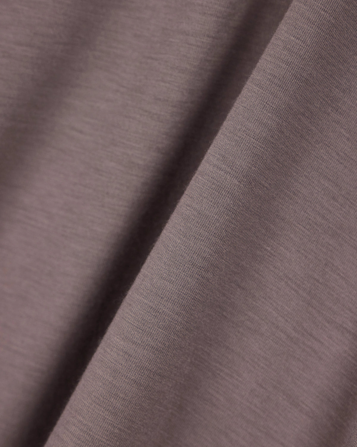 Stretch polo in viscose jersey with buttonless collar