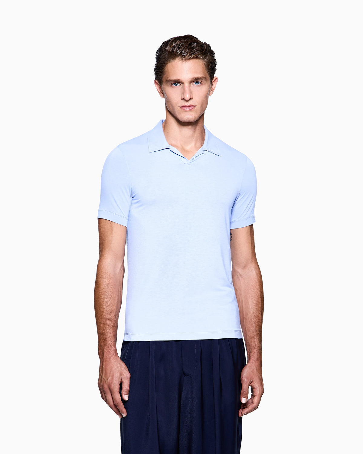 Stretch polo in viscose jersey with buttonless collar