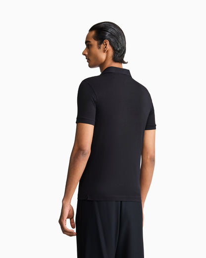 Stretch polo in viscose jersey with buttonless collar