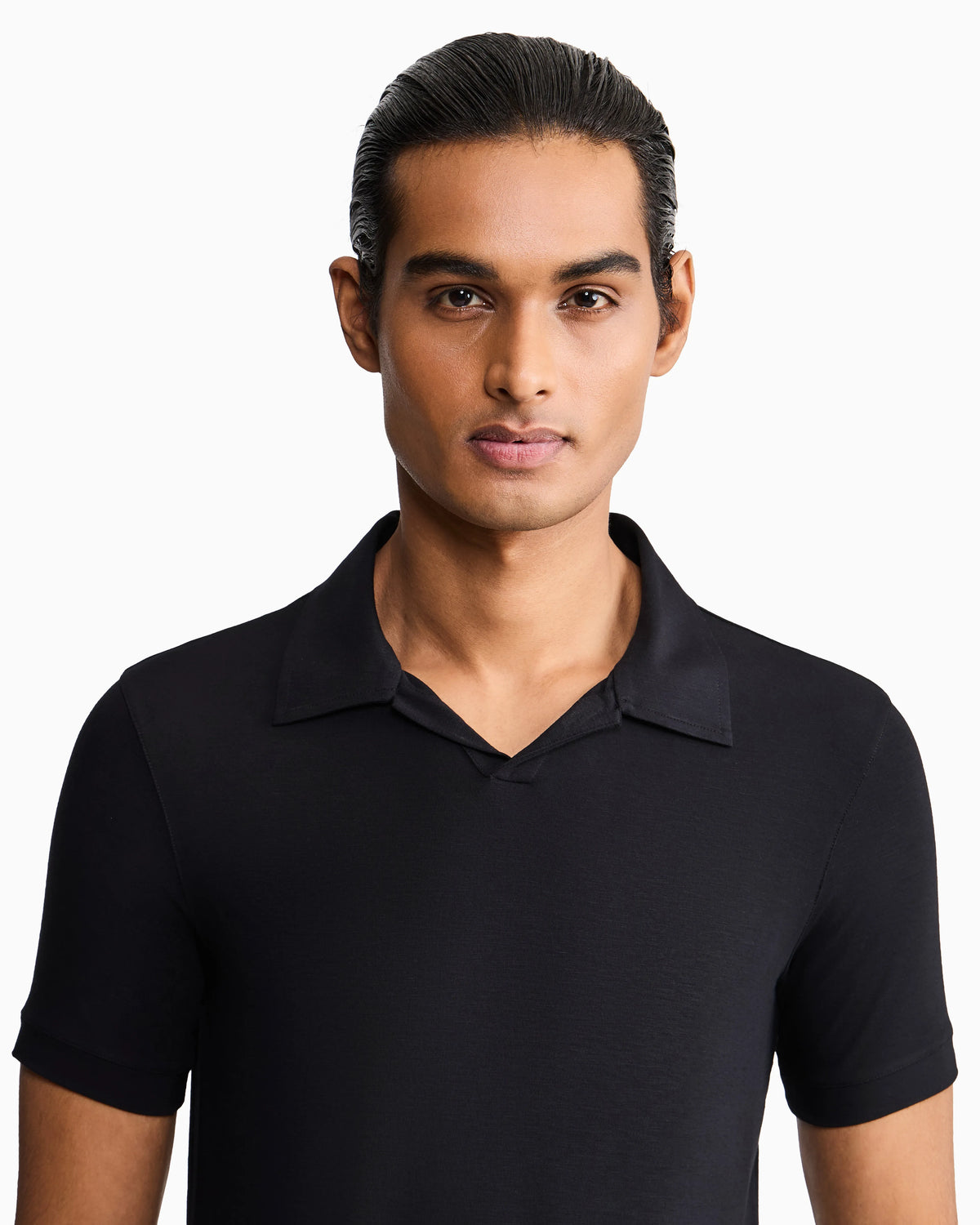 Stretch polo in viscose jersey with buttonless collar