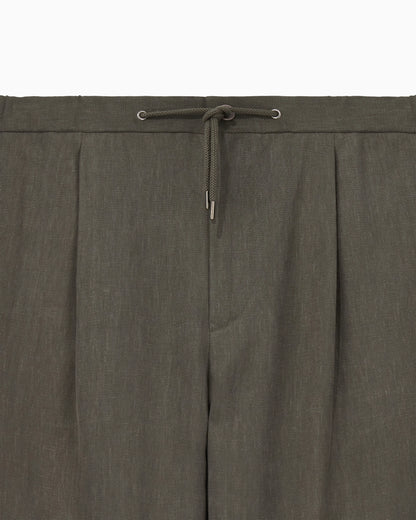 Linen trousers with a single pleat and drawstring
