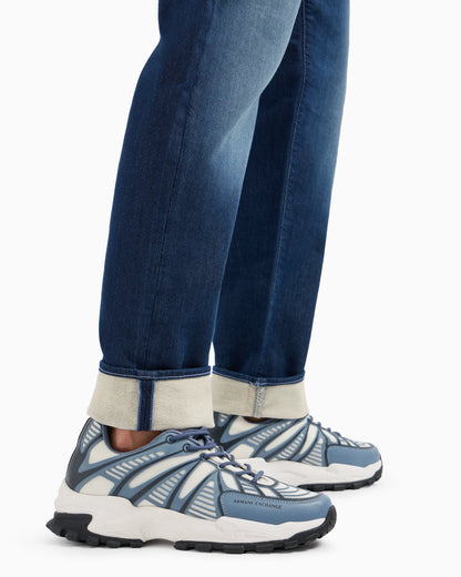 J13 slim fit jeans in indigo denim