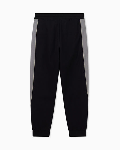 Slim-fit trousers in cotton-blend jersey with rib details