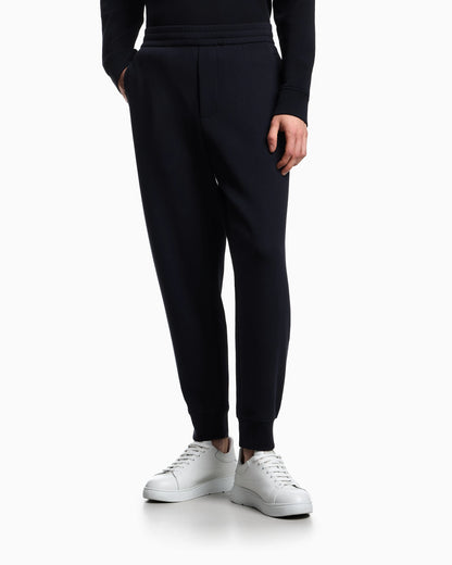 Double-jersey joggers with embossed embroidered EA logo