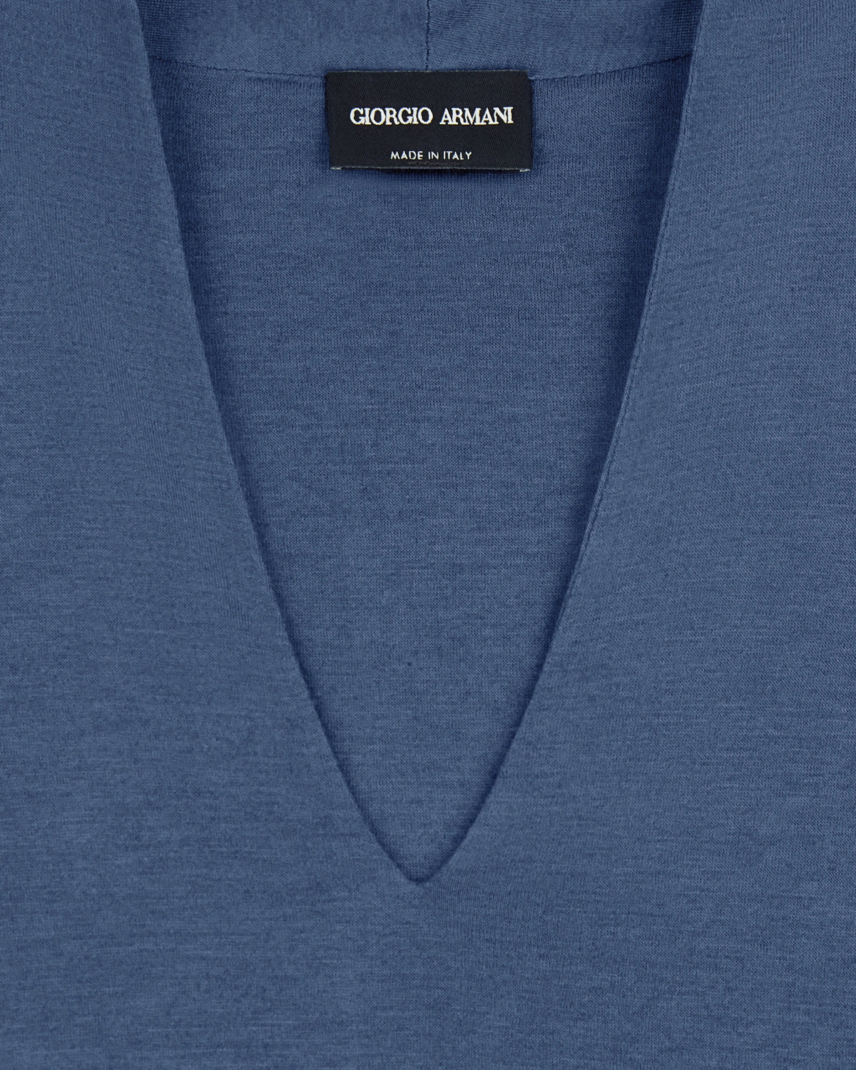 Short sleeve top  in knit with a deep V-neck