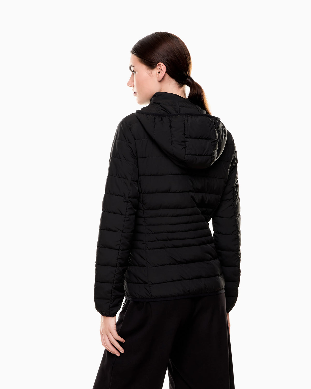 Padded jacket in technical fabric with a hood and zipper