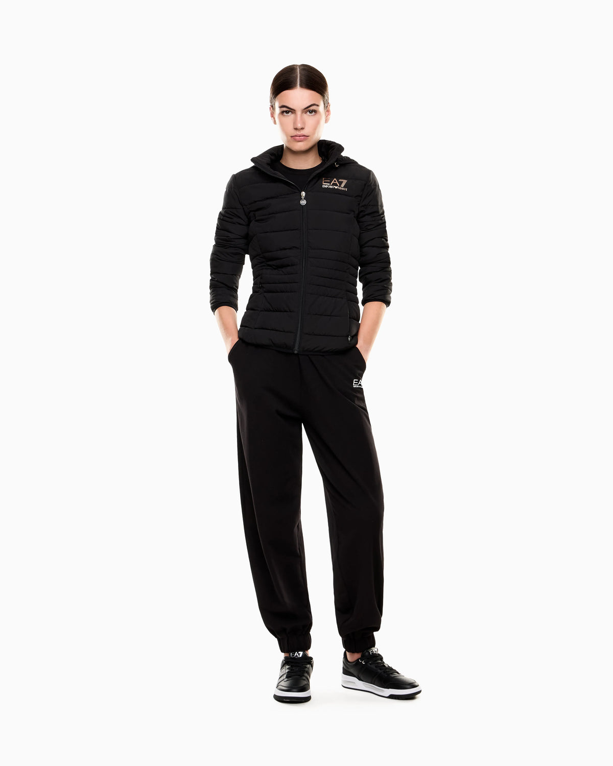 Padded jacket in technical fabric with a hood and zipper