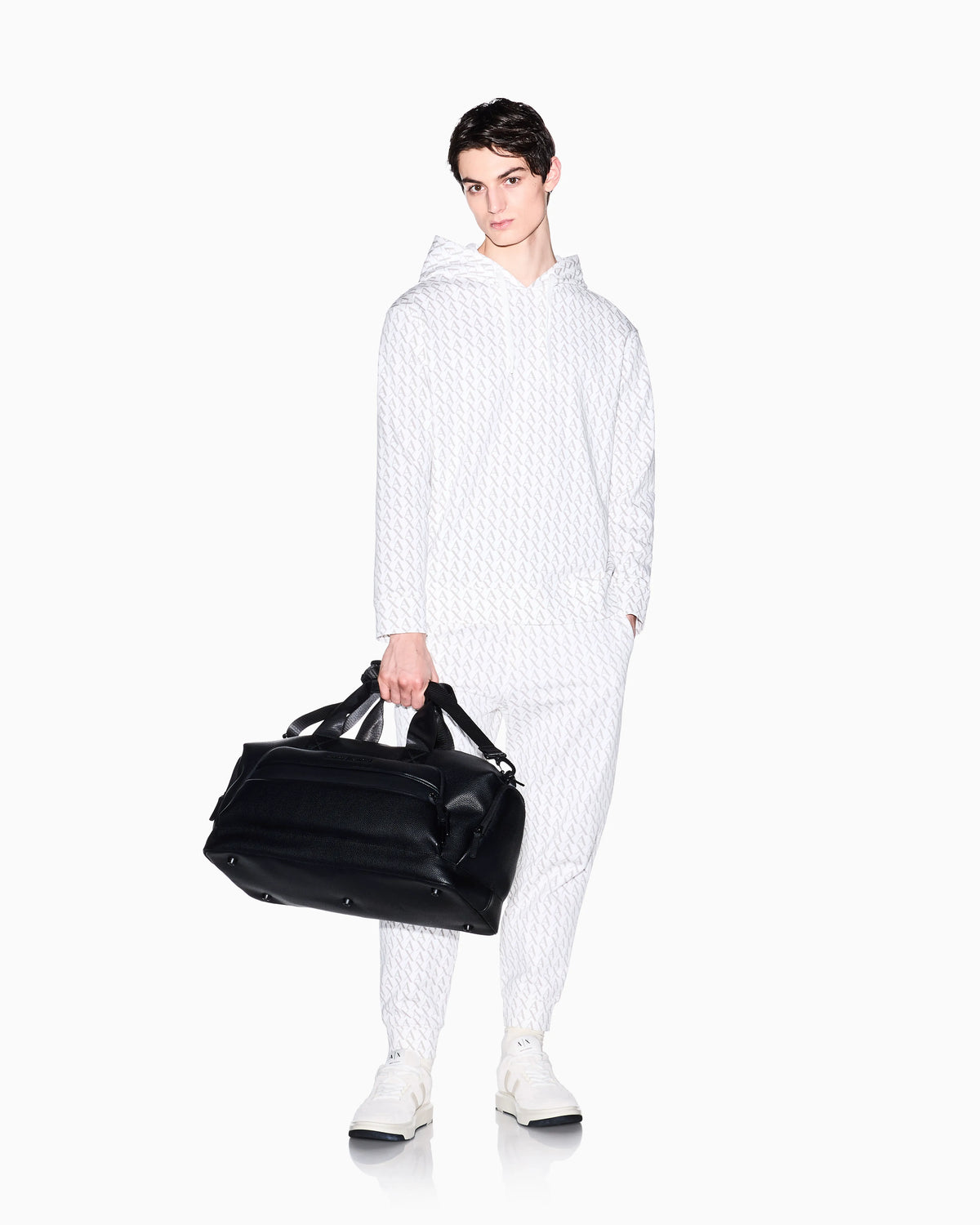 Jogger pants in fabric with allover logo pattern