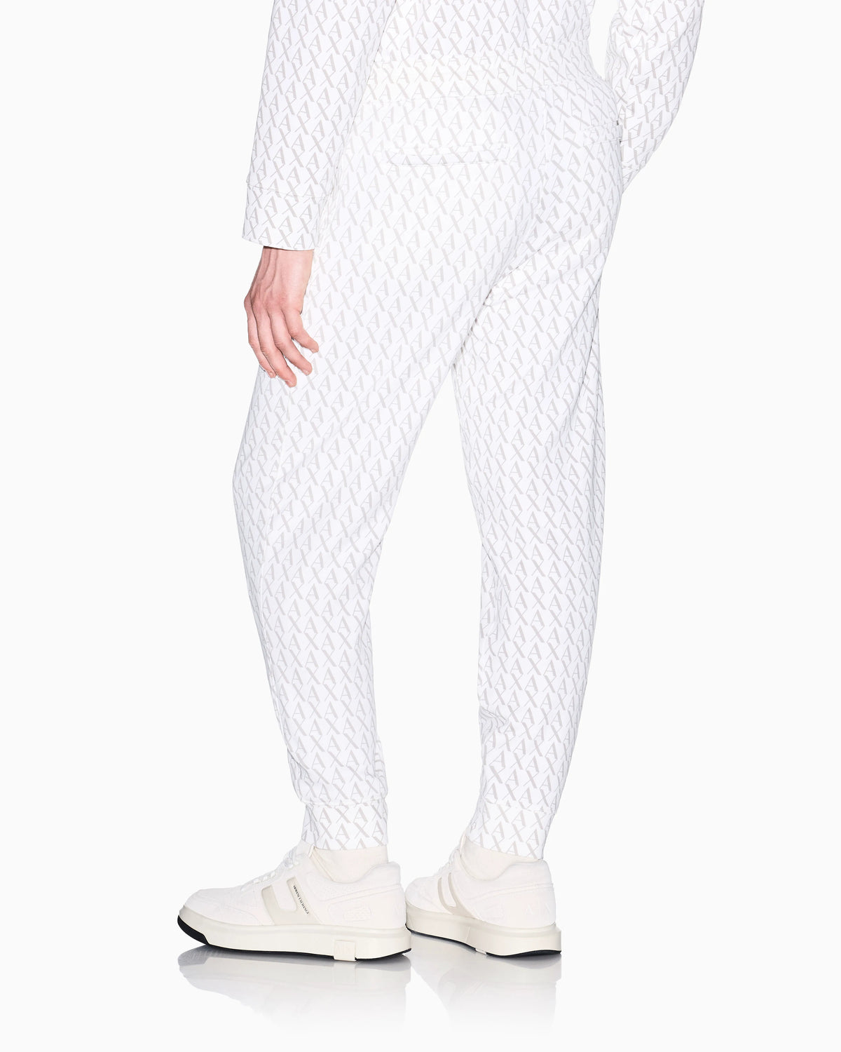 Jogger pants in fabric with allover logo pattern