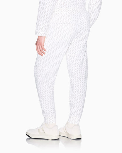Jogger pants in fabric with allover logo pattern
