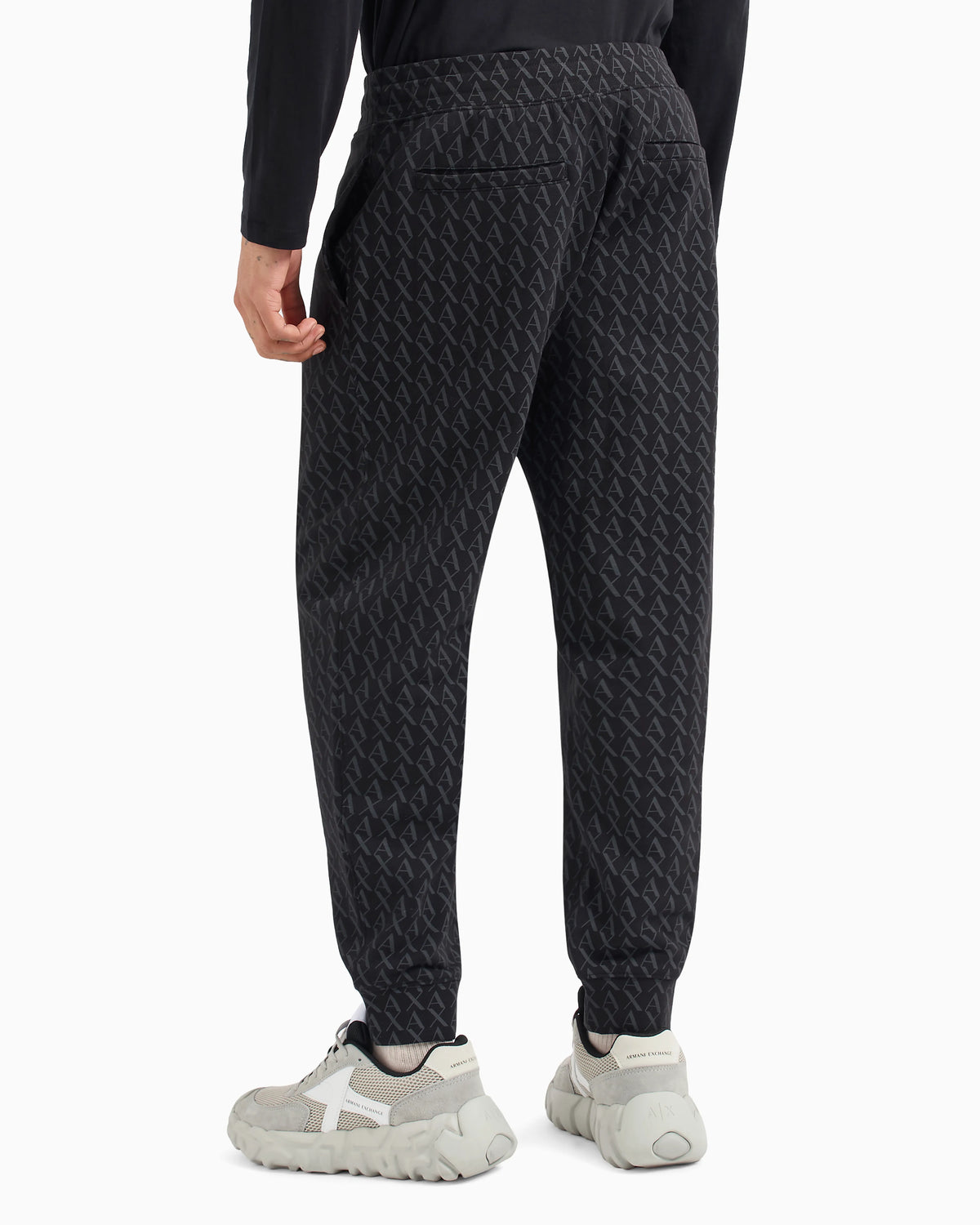 Jogger pants in fabric with allover logo pattern