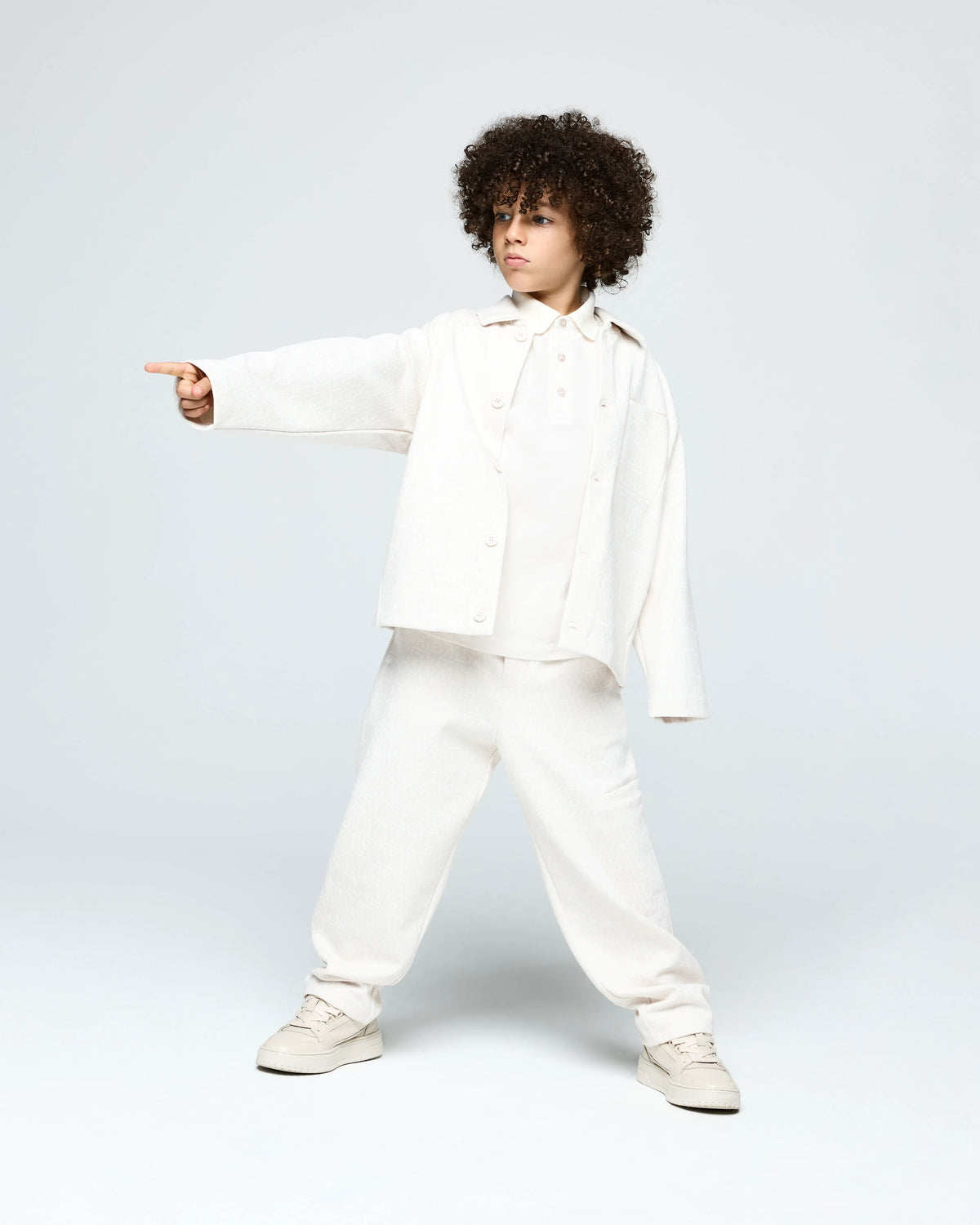 Polo shirt in cotton piqué with a three-button placket