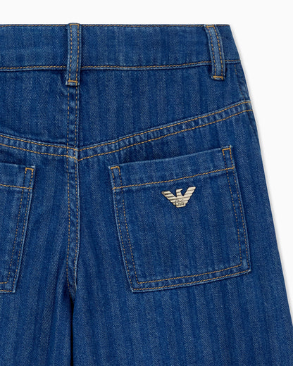 Wide-leg denim jeans with vertical stripes and a cuffed hem