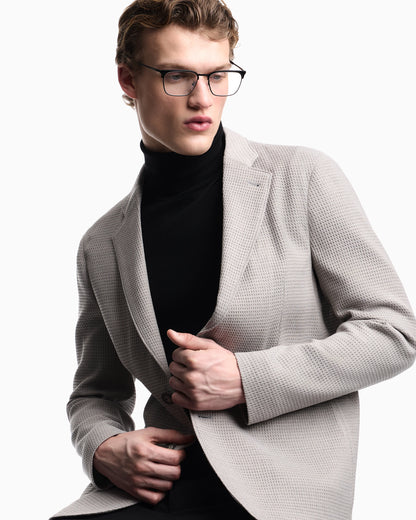 Single-breasted jacket in 3D waffle-effect wool jersey