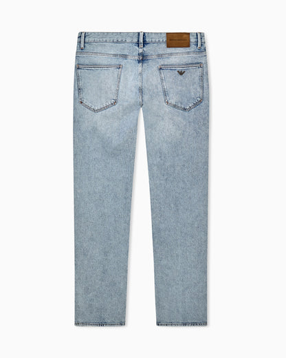 Five-pocket slim fit stone-washed jeans with metallic logo