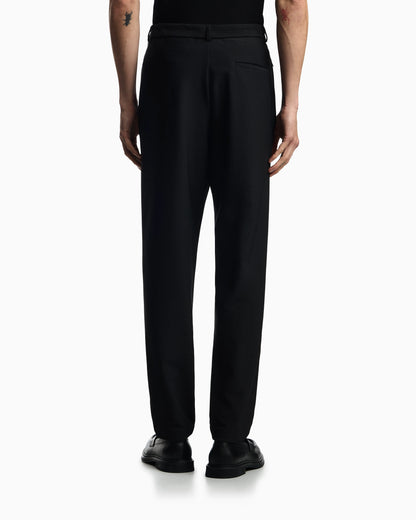 Technical jersey trousers with 3D-effect micro texture
