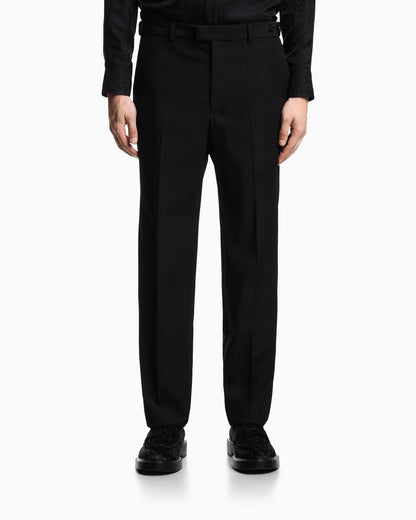 Trousers with a pleat in virgin wool with a technical finish