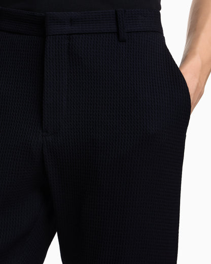 3D waffle-effect wool-jersey trousers