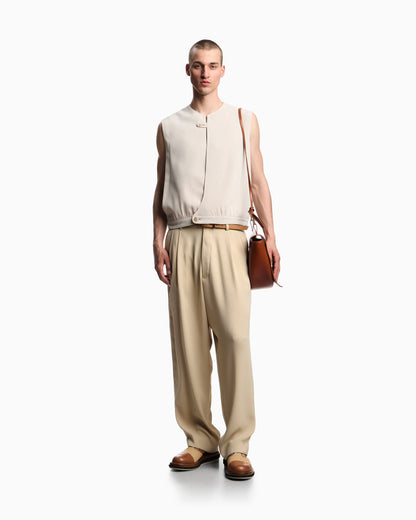Fluid sandblasted fabric trousers with pleats