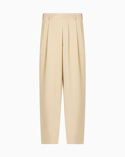 Fluid sandblasted fabric trousers with pleats