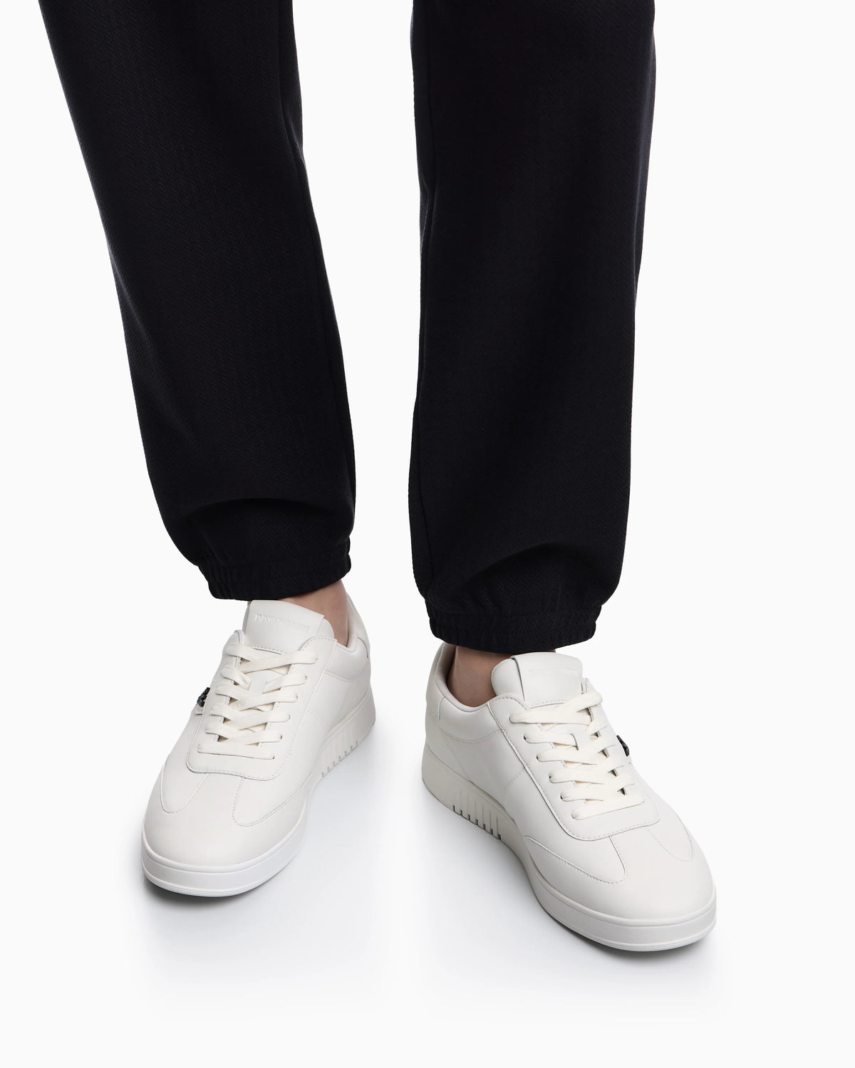 Leather sneakers with eagle plate