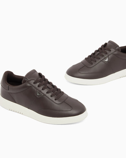 Leather sneakers with eagle plate