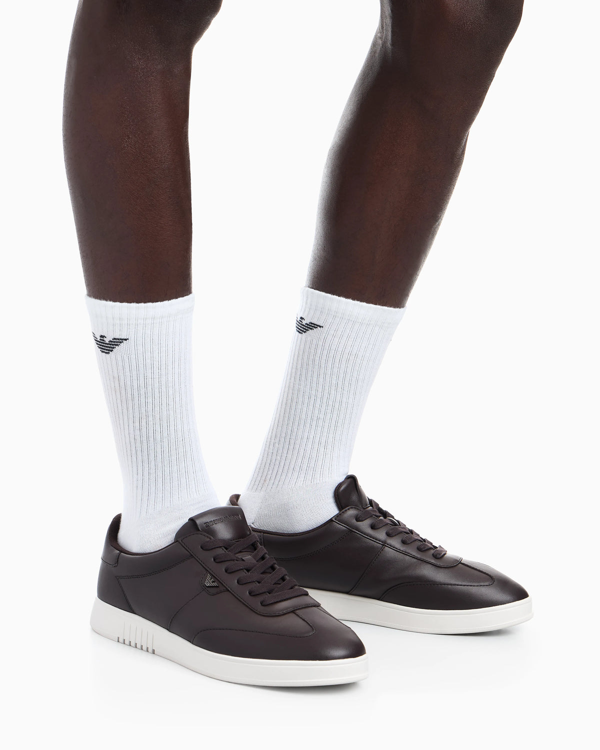 Leather sneakers with eagle plate