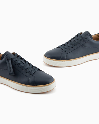 Leather sneakers with a contrasting welt