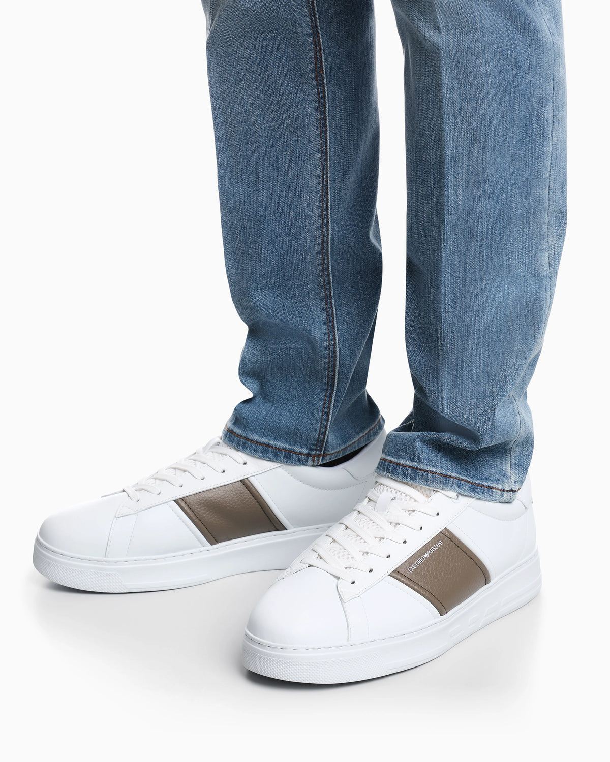 Leather sneakers with an embossed logo and contrasting panel