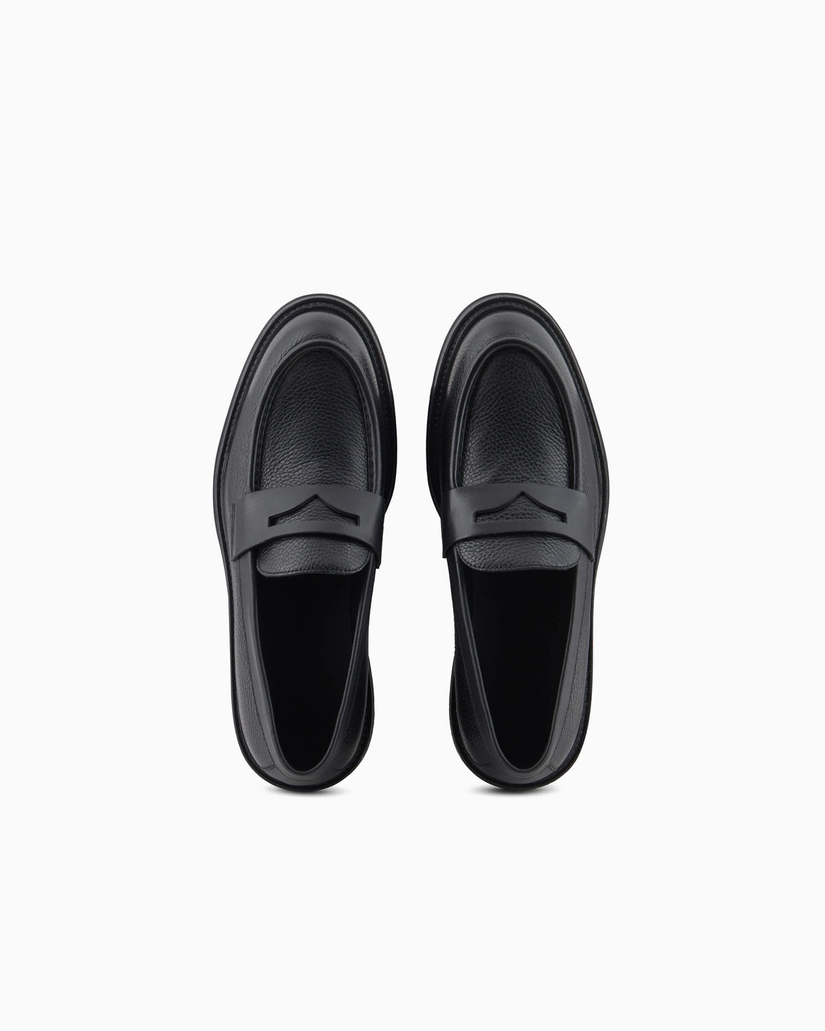 Slip-on loafer in pebbled leather with smooth inserts