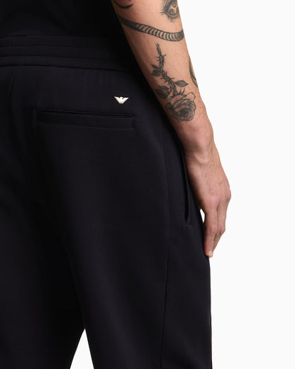 Double jersey joggers with side zip pockets Essential