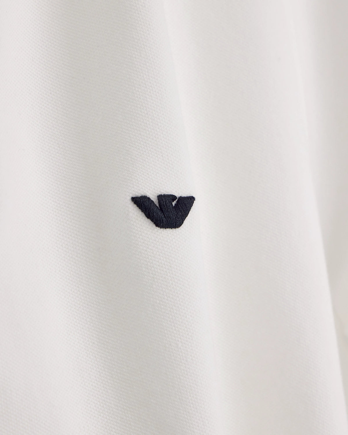 Slim-fit stretch piqué polo shirt with micro eagle