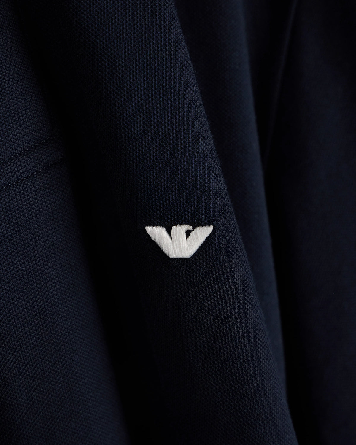 Slim-fit stretch piqué polo shirt with micro eagle
