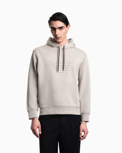 Loose-fit hooded sweatshirt in French terry jersey with a domed eagle