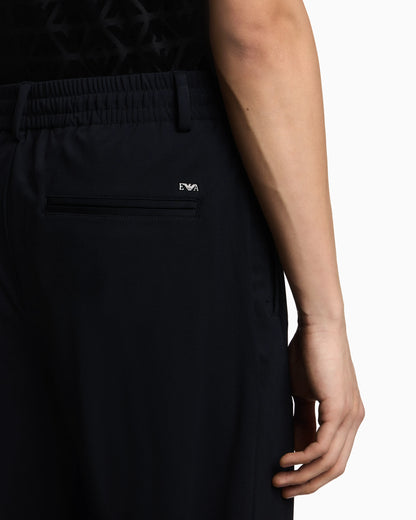 Stretch-nylon trousers with an elasticated hem
