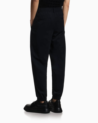 Stretch-nylon trousers with an elasticated hem