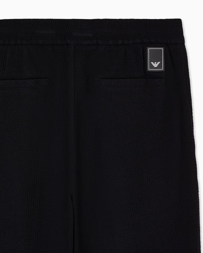 Travel Essential embossed jersey joggers