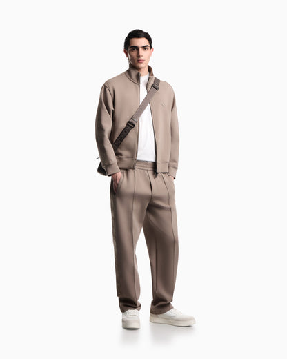 Double-jersey trousers with micro eagle logo band
