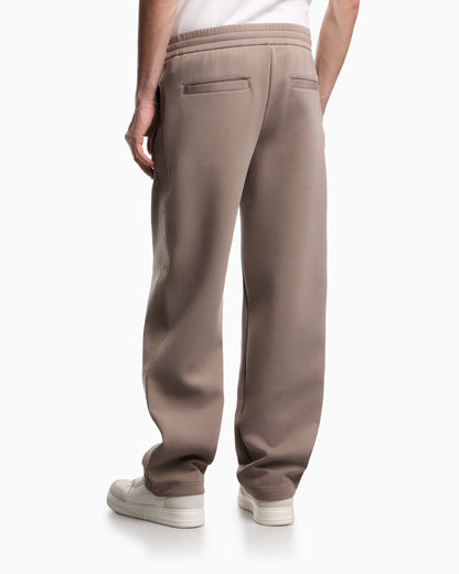 Double-jersey trousers with micro eagle logo band