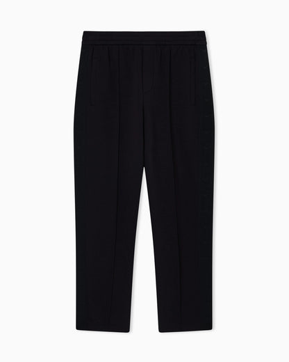 Double-jersey trousers with micro eagle logo band